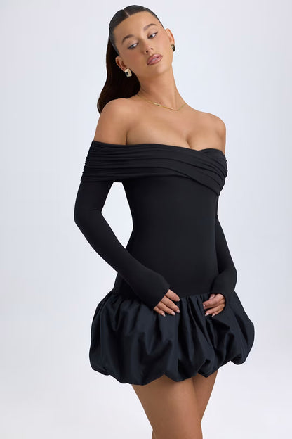 SERRA MODAL OFF - SHOULDER BUBBLE HEM MINI DRESS IN BLACK